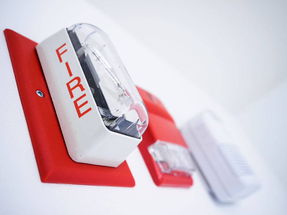 What are the code requirements for a fire alarm system?